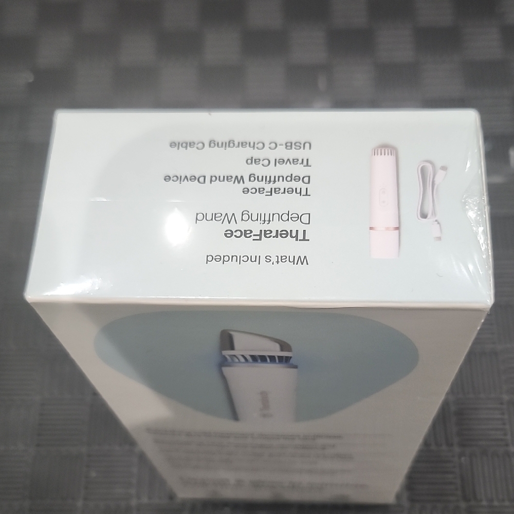 Therabody TheraFace Depuffomg Wand in White - Picture 6 of 6